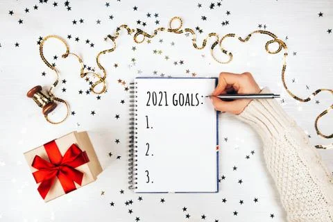 Notebook with new year resolutions list Stock Photos