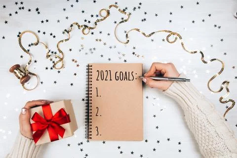 Notebook with new year resolutions list Stock Photos