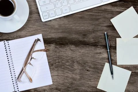 Notebook with notes and keyboard computer on desk Stock Photos