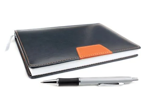 Notebook office organizer and Funky ballpoint pen. On a white background. Stock Photos