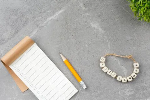 Notebook office work on gray marble background Stock Photos