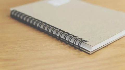 Notebook or note paper sheet retro style on table Stock Photos