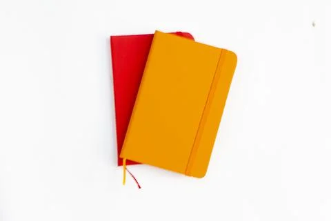Notebook orange and red Stock Photos