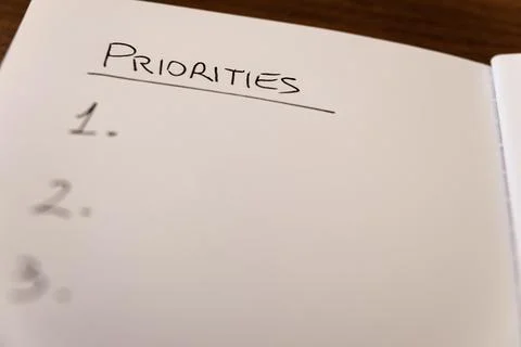 Notebook page marked `Priorities` Stock Photos