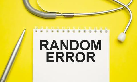 Notebook page with text RANDOM ERROR , on a table with a stethoscope and pen Stock Photos