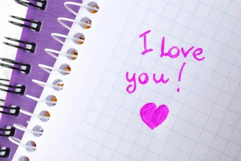 Notebook page with written words I LOVE YOU and heart, top view Foto stock