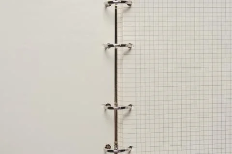 Notebook with pages in a cell. Blank page of open notebook Stock Photos