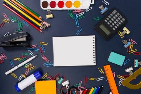 Notebook with a pen on a blue background Stock Photos