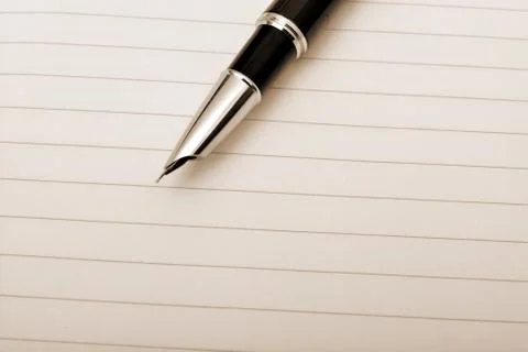 Notebook with pen close up copy space Stock-Fotos