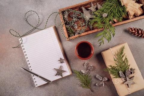 Notebook with pen, handmade gift box and Christmas wooden decor Foto stock