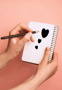 Notebook with pen on light background Stock Photos