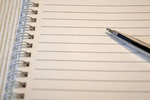 Notebook with pen on lined paper Stock Photos