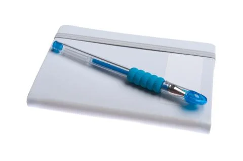 Notebook with pen Stock Photos