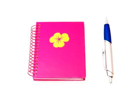 Notebook with pen Stock Photos