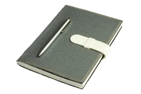 Notebook with pen Stock Photos