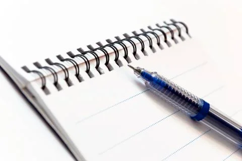Notebook With Pen Stock-Fotos