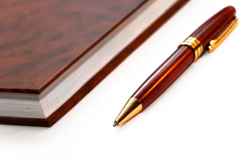 Notebook With Pen Stock Photos