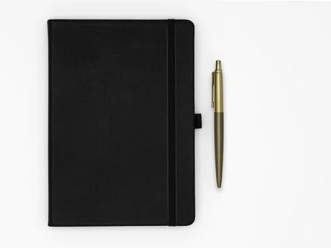 Notebook with pen Stock Photos
