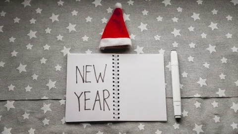 Notebook with pen to write goals of new year Stock Photos