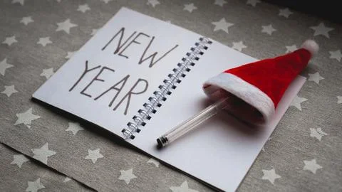 Notebook with pen to write goals of new year Stock Photos