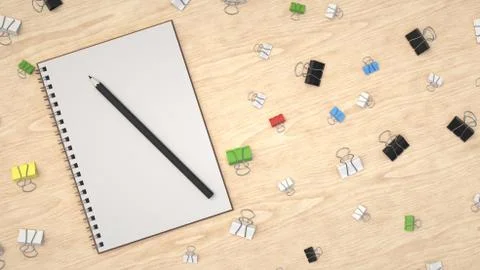Notebook with pencil and binder clips Illustrazione stock