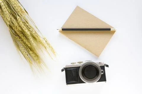 Notebook ,pencil and camera on white background. Stock Photos