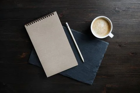 Notebook, pencil, coffee cup Stock Photos