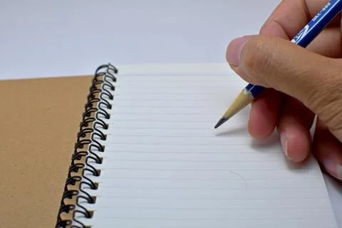 Notebook with pencil Stock Photos