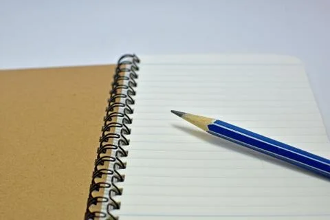 Notebook with pencil Stock Photos