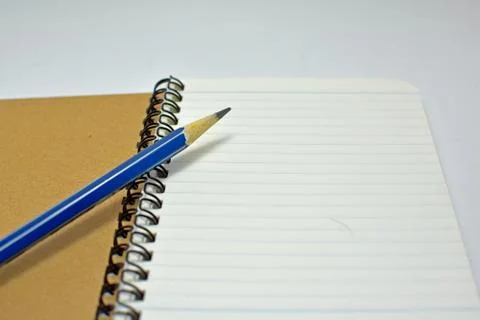 Notebook with pencil Stock Photos