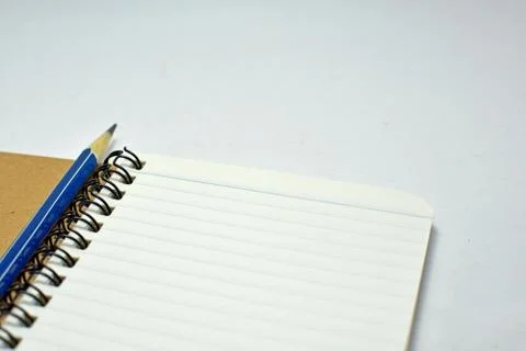 Notebook with pencil Stock Photos