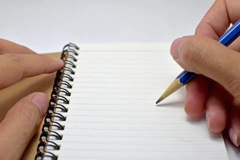 Notebook with pencil Stock Photos