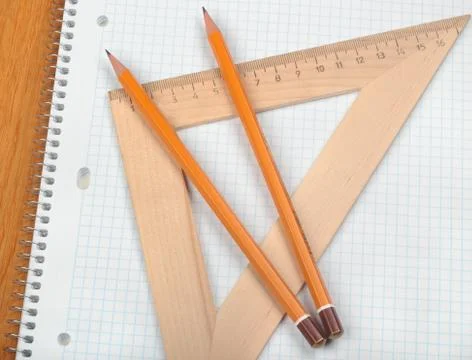 Notebook with pencils and triangle Stock Photos