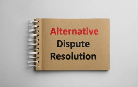 Notebook with phrase Alternative Dispute Resolution on white background, to.. 스톡 사진