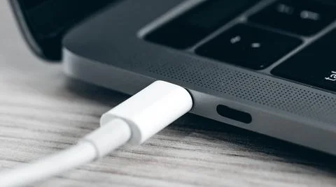 Notebook power and data cable connection Foto stock