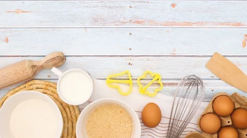 Notebook for recipe appear on table with cooking ingredients - Stop motion Stock Footage 128593462