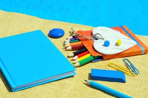 Notebook with school supplies. Stock Photos