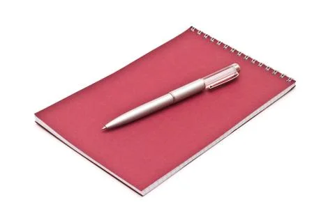 Notebook with silver pen, isolated on white Stock Photos