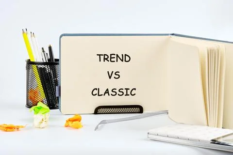 Notebook sits open on a bright white surface showcasing text about choosing b Stock Photos