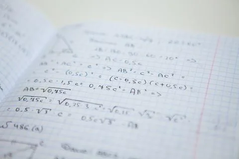 Notebook with some exercices, equations, close up Stock Photos