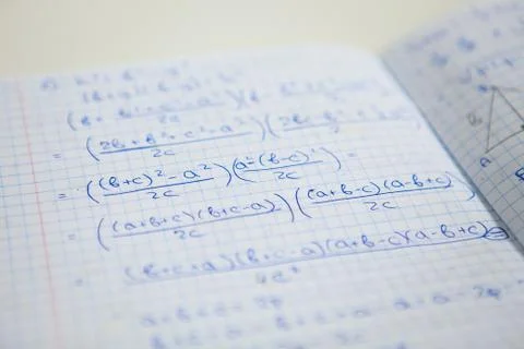 Notebook with some exercices, equations, close up Stock Photos