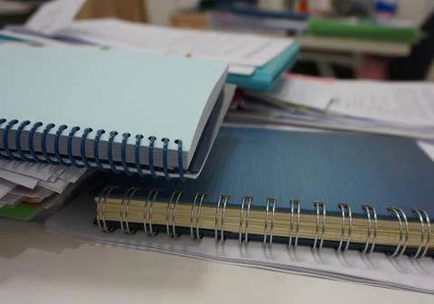 Notebook with a spiral spine and document Stock Photos