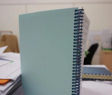 Notebook with spiral spine Stock Photos