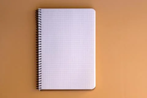 Notebook with spring and sheets in a cage top view. Blank paper in a notebook Stock Photos