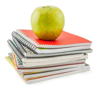 Notebook stack and apple. Schoolchild and student studies accessories. Back t Stock Photos