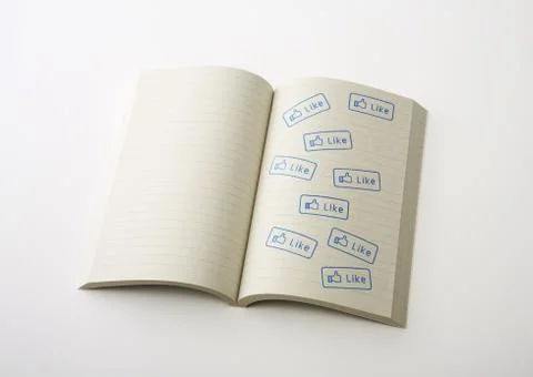 Notebook with "like" stamps Stockfoto's