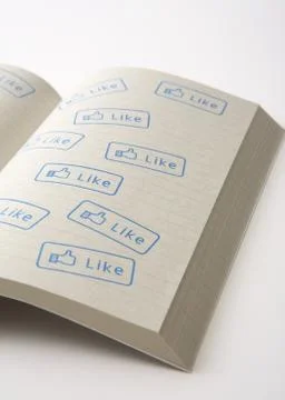 Notebook with "like" stamps Stock Photos