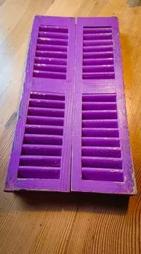 Notebook stylized as small pink window shutters Stock Photos