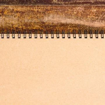 Notebook on table Stock Photos