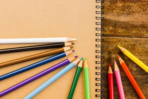 Notebook on table Stock Photos